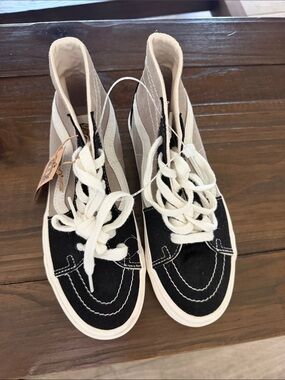 Vans High-Top Sneakers in Black and Cream